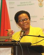 Deputy Minister, Mrs Pamela Tshwete, rendering her keynote address, where she spoke about the War on Leaks program and its achievements with assisting unemployed youth